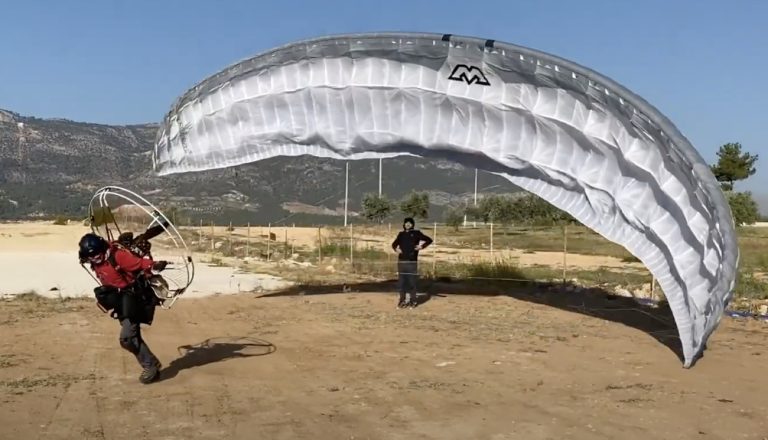 Student and instructor during paragliding ground handling training in Ermenek