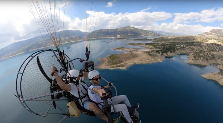 Student practicing paramotoring ground handling during training in Ermenek