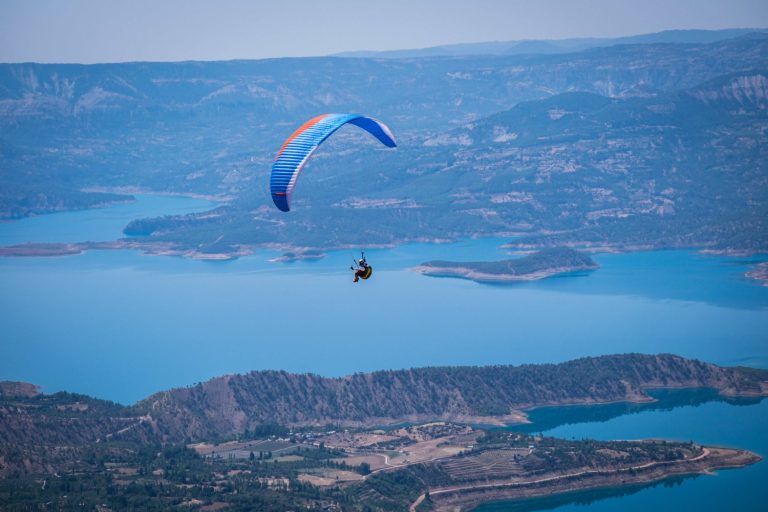 Paragliding over the Blue Lagoon in Ölüdeniz, Turkey with stunning Mediterranean coastal views